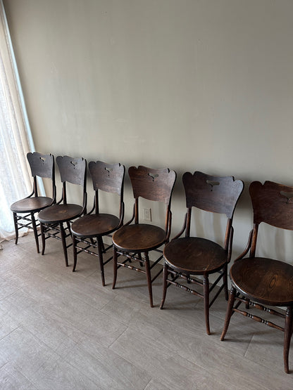 6 dark oak parlor chairs. Sold in sets of 2.