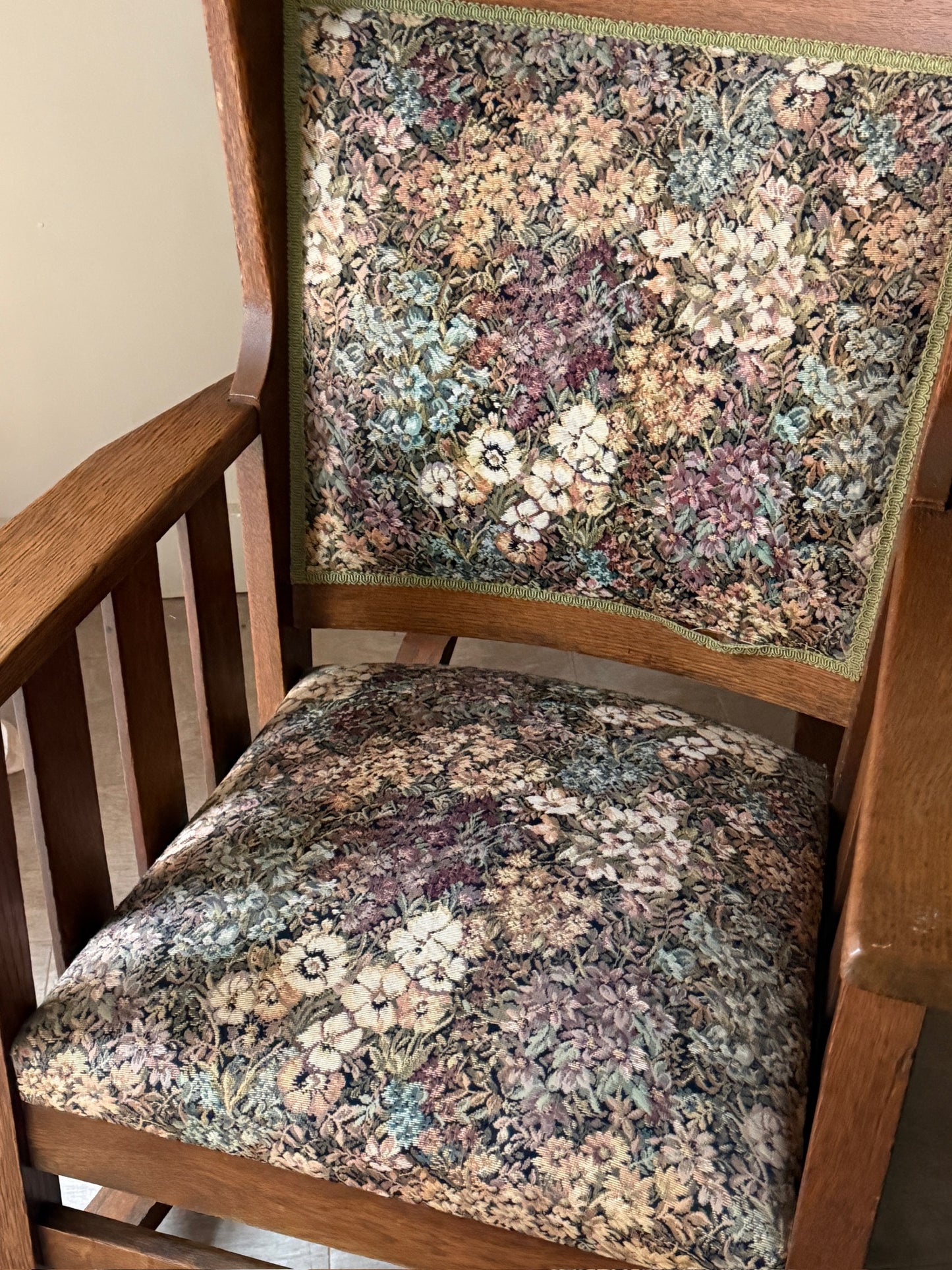 Upholstered golden oak rocking chair