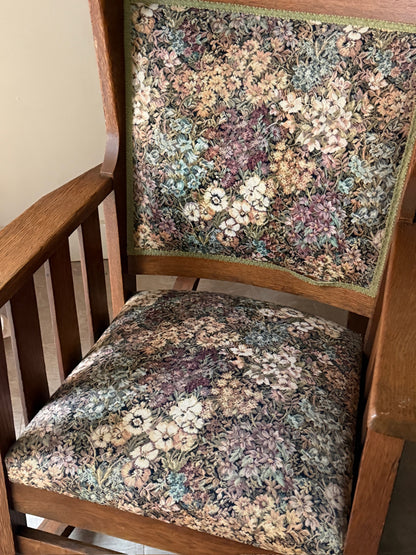 Upholstered golden oak rocking chair