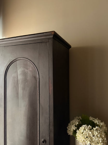 Dark stained chimney cupboard