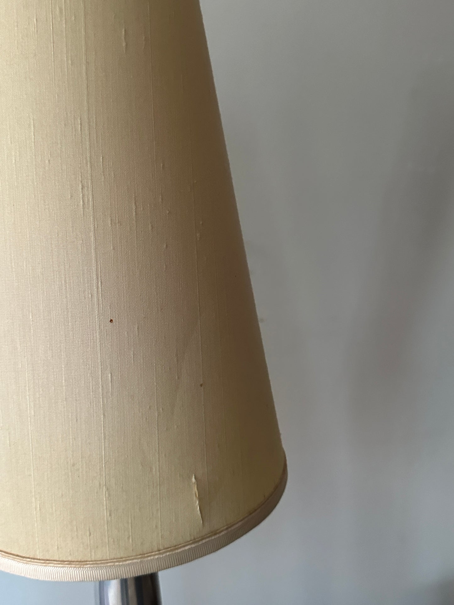 Lucien Gau Paris brushed crome table lamps. Sold as a pair.