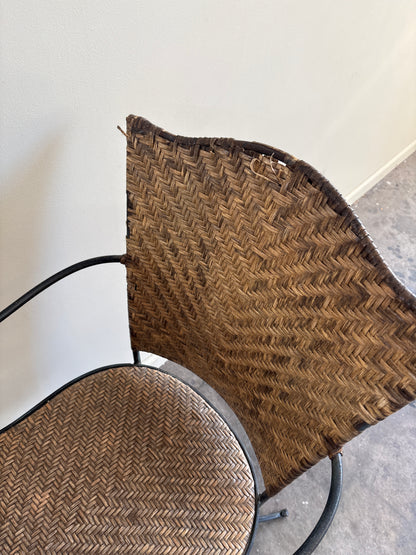 Wrought iron armchairs with woven bamboo backs & seats. Sold individually.