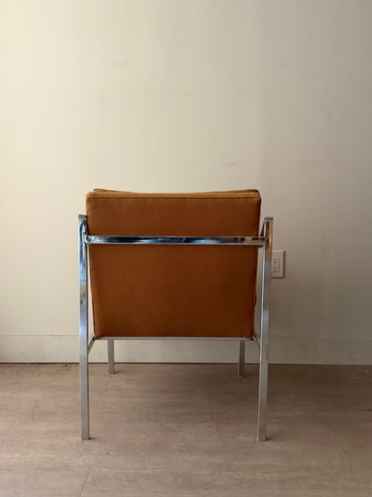Ochre upholstered chrome armchair