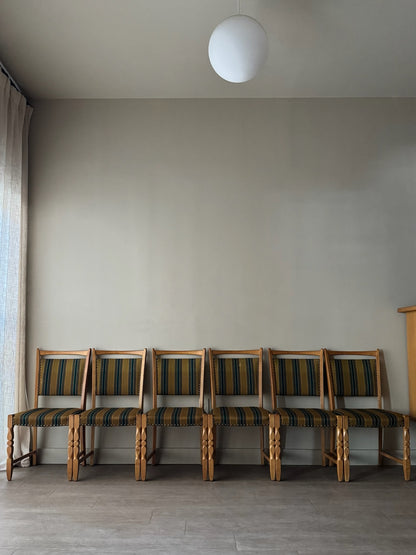 Danish oak dining chairs with striped upholstery. Sold in pairs.