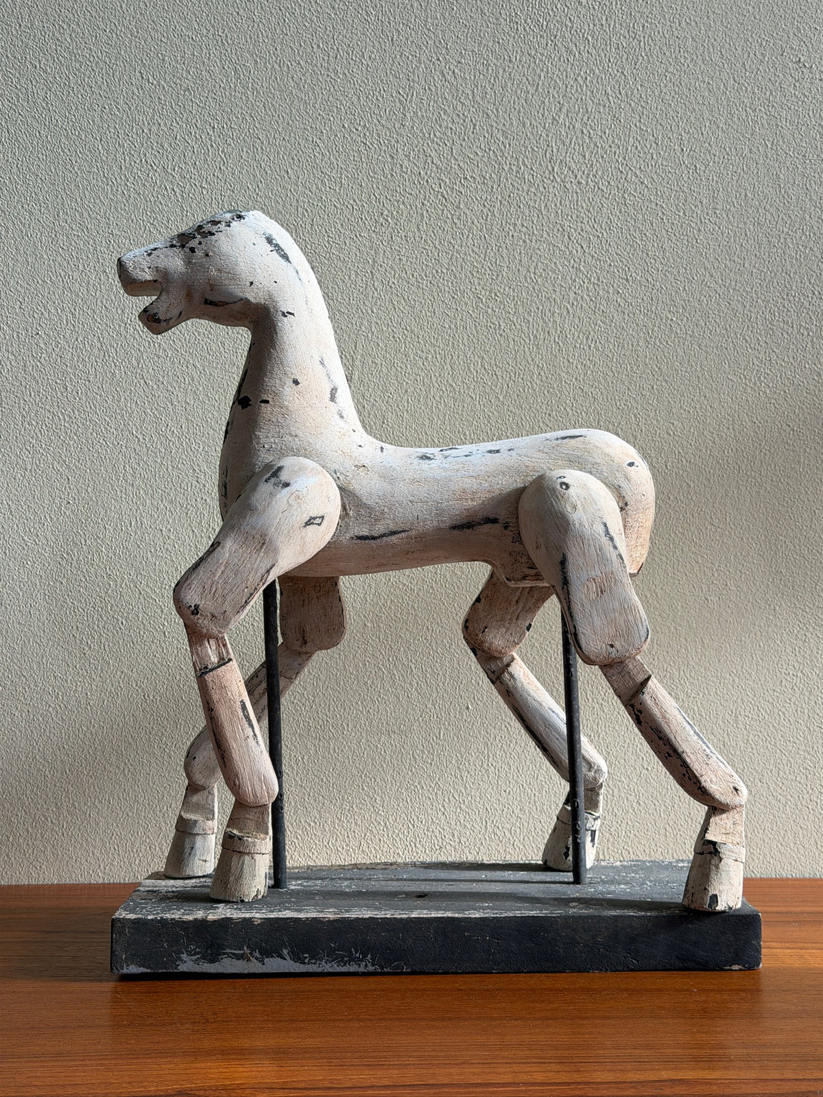 Folk art painted horse sculpture