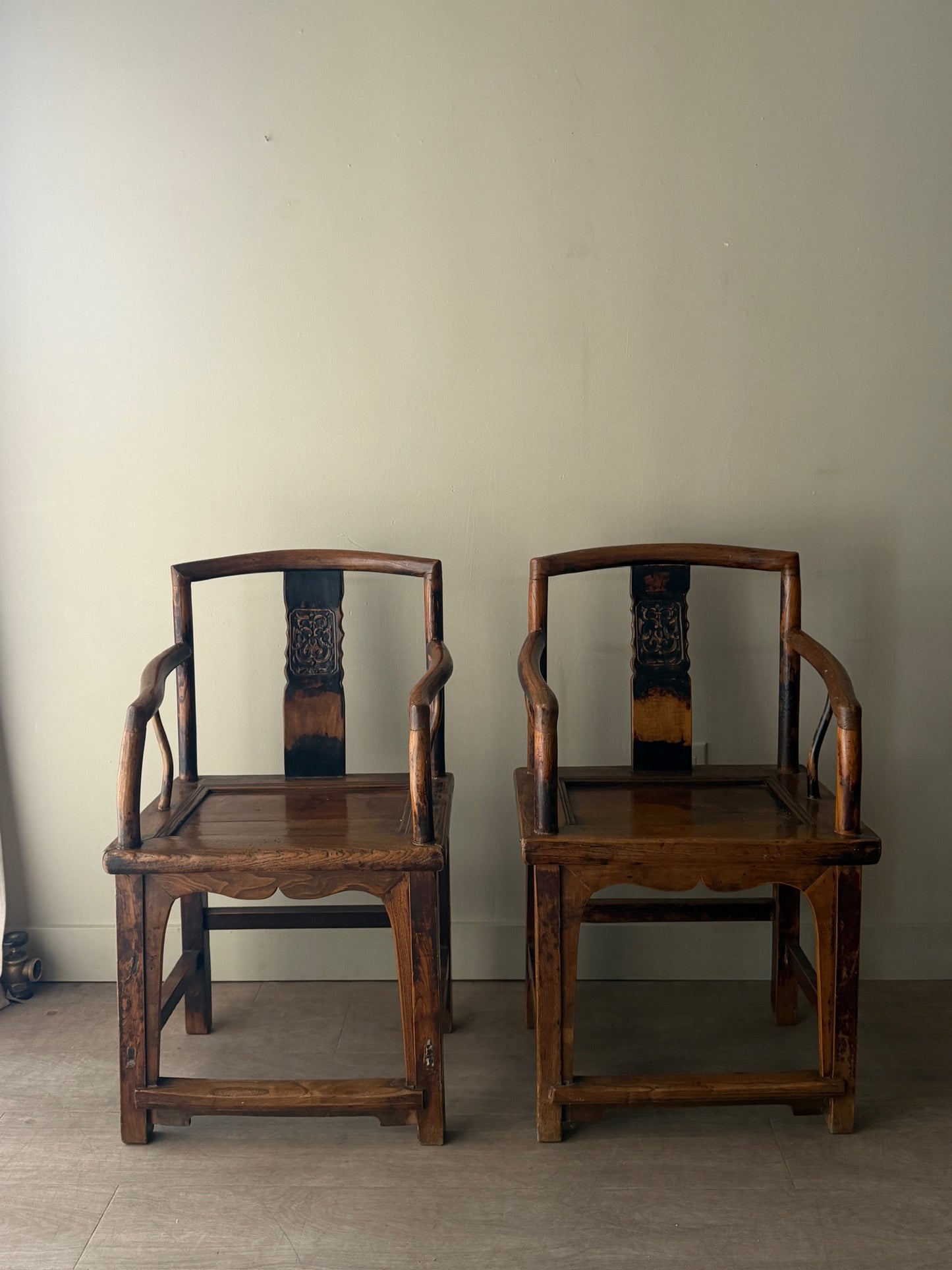 Chinese elmwood chairs. Sold individually.