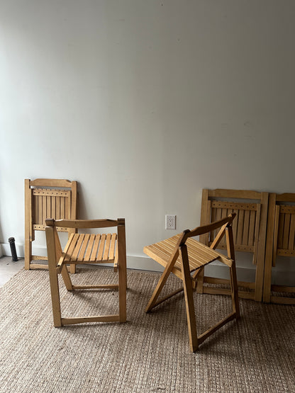 5 folding dining chairs. Sold individually.