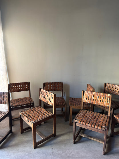 10 Jens Risom style woven leather dining chairs. Sold individually.