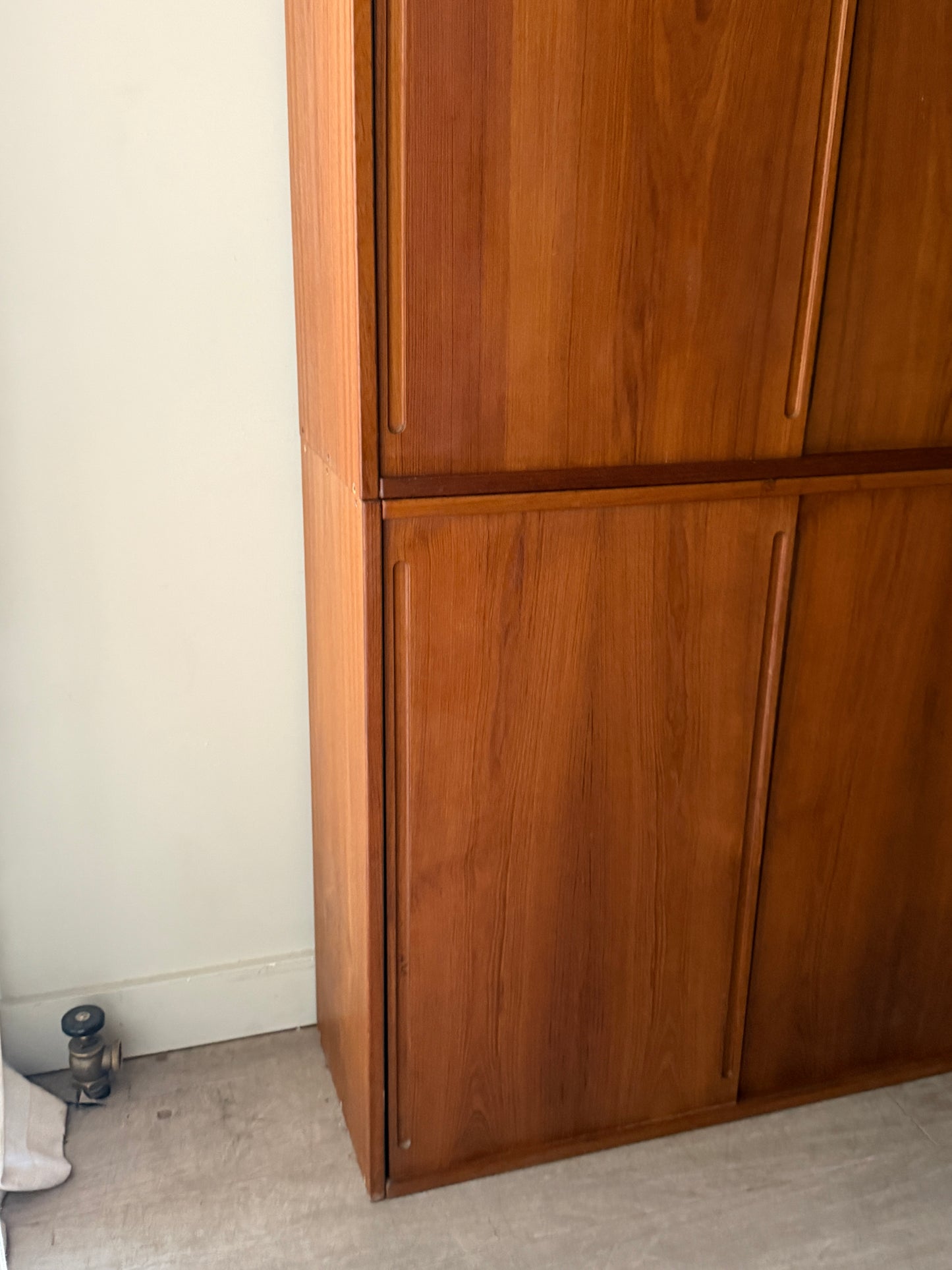 Two piece teak cabinet
