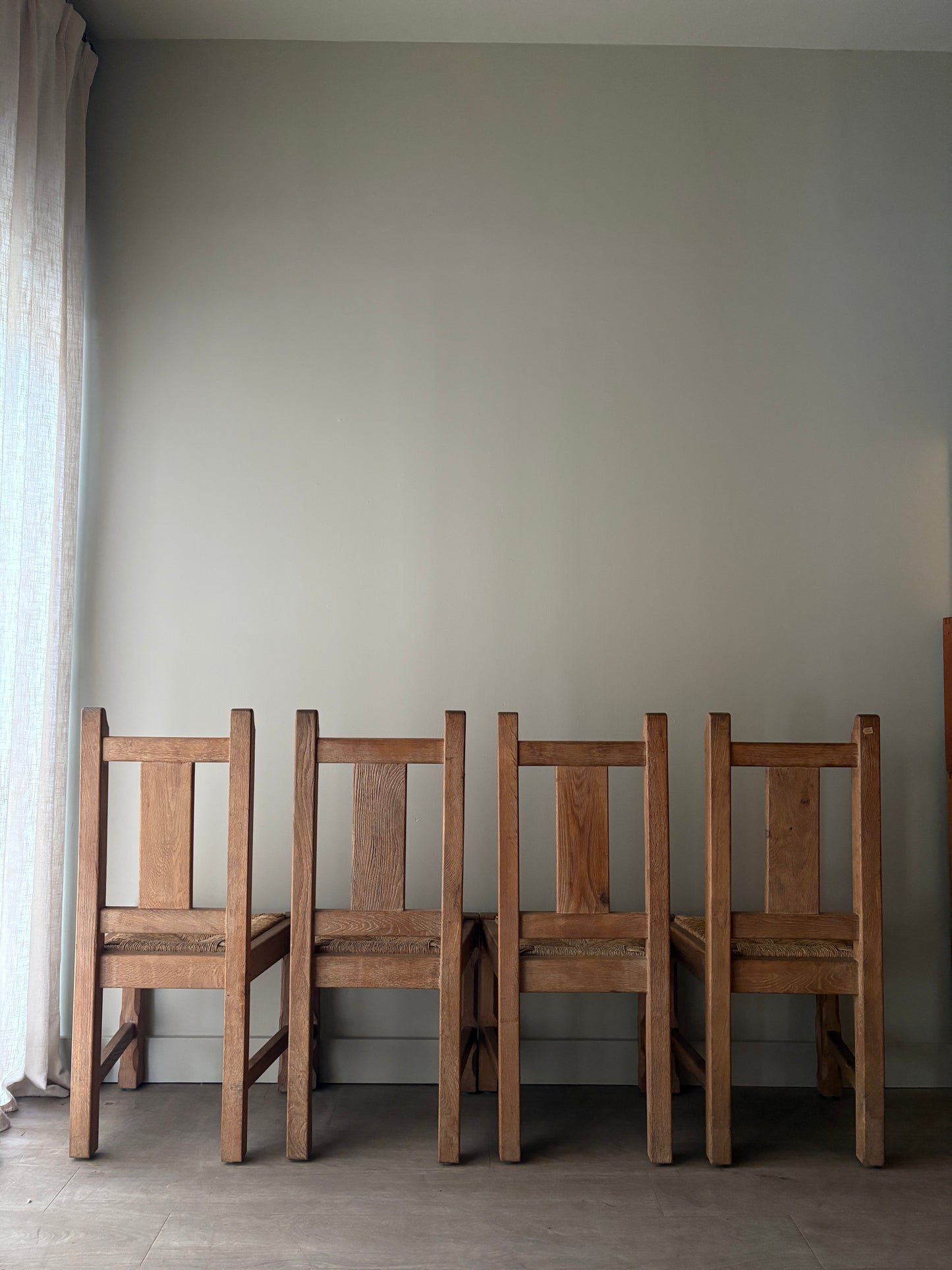 Belgian De Puydt oak & rush dining chairs. Sold in pairs.