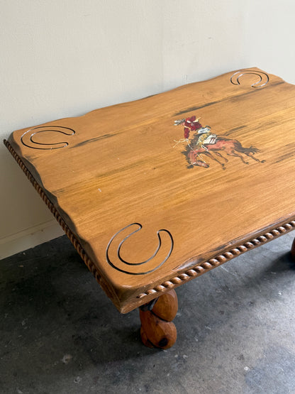 Pine coffee table with equestrian motifs