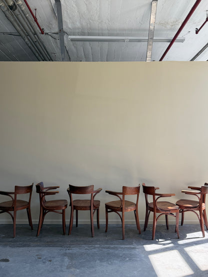 Thonet bentwood arm chairs. Sold in pairs.