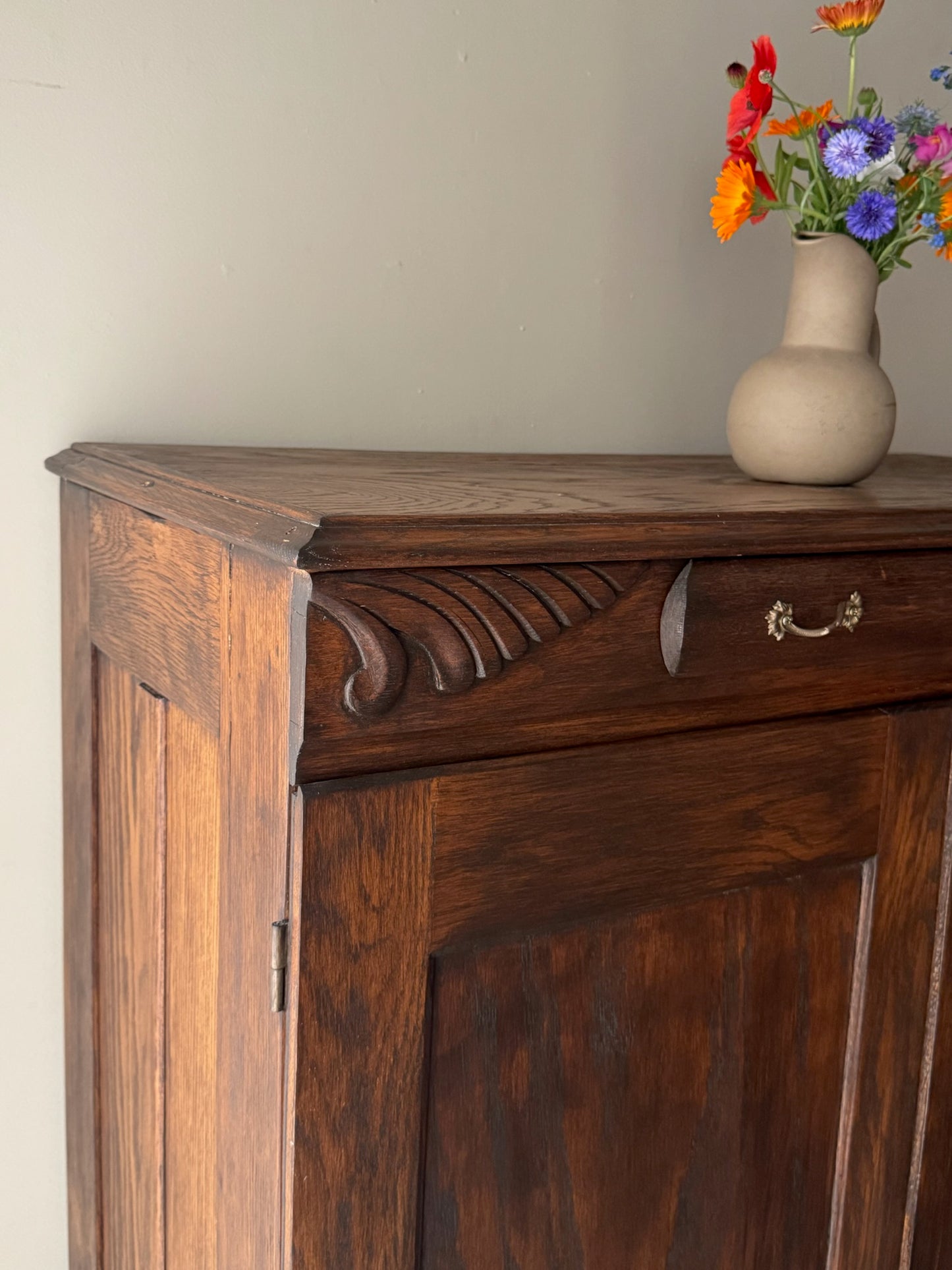 Golden oak cupboard with mirror