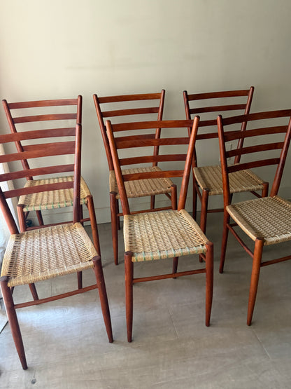 Chiavari Spinetto ladder back dining chairs with wicker cord seats. Sold as a set of 6.