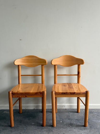 Rainer Daumillier pine dining chairs. Sold individually.