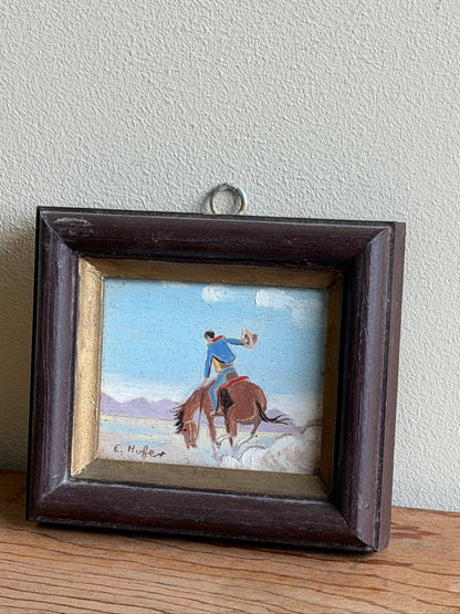 Small cowboy oil painting by E. Hofer