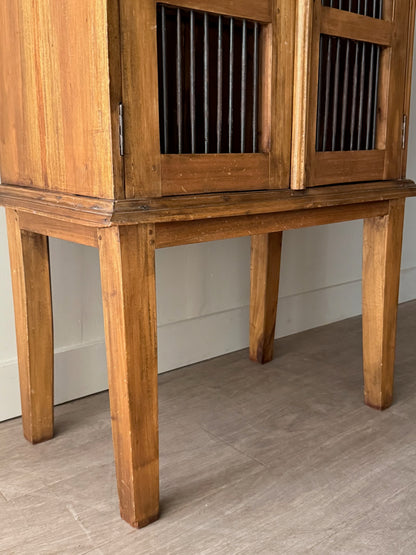 Walnut spindle door cabinet