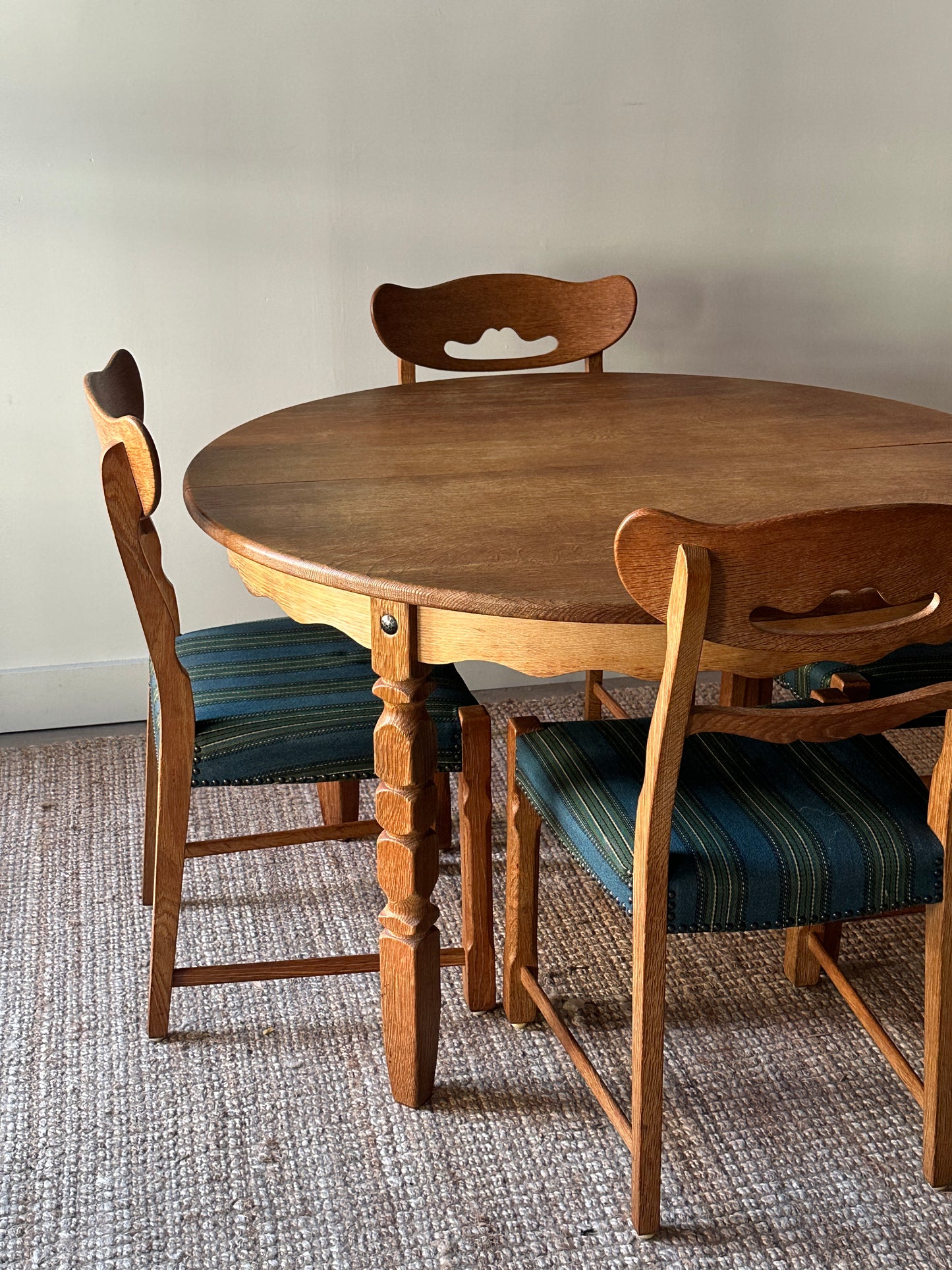 Carved block leg dining table with leaf