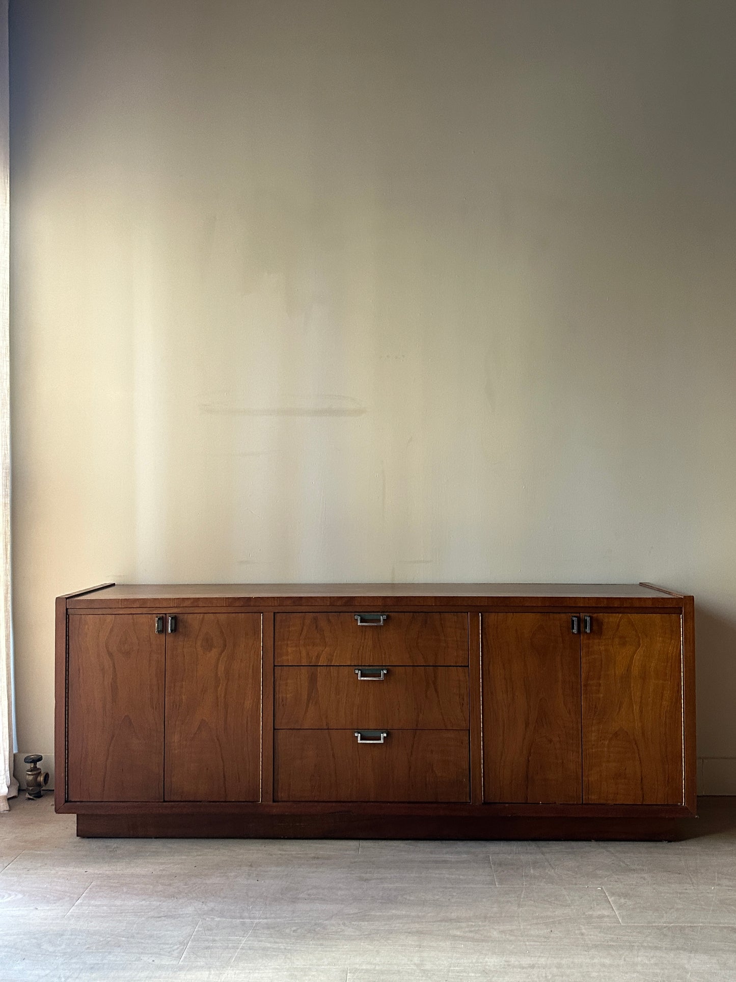 Walnut credenza with chrome pulls
