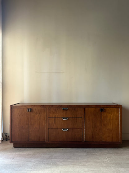 Walnut credenza with chrome pulls