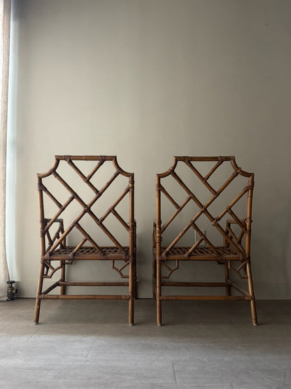Bamboo arm chairs. Sold individually.