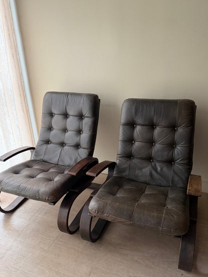 Danish beech bentwood and leather lounge chairs. Sold individually.