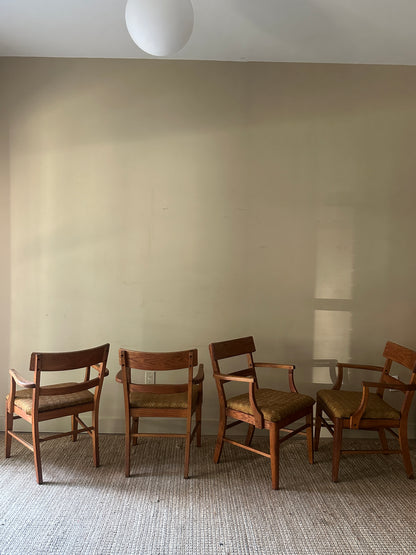 Oak arm chairs. Sold individually.