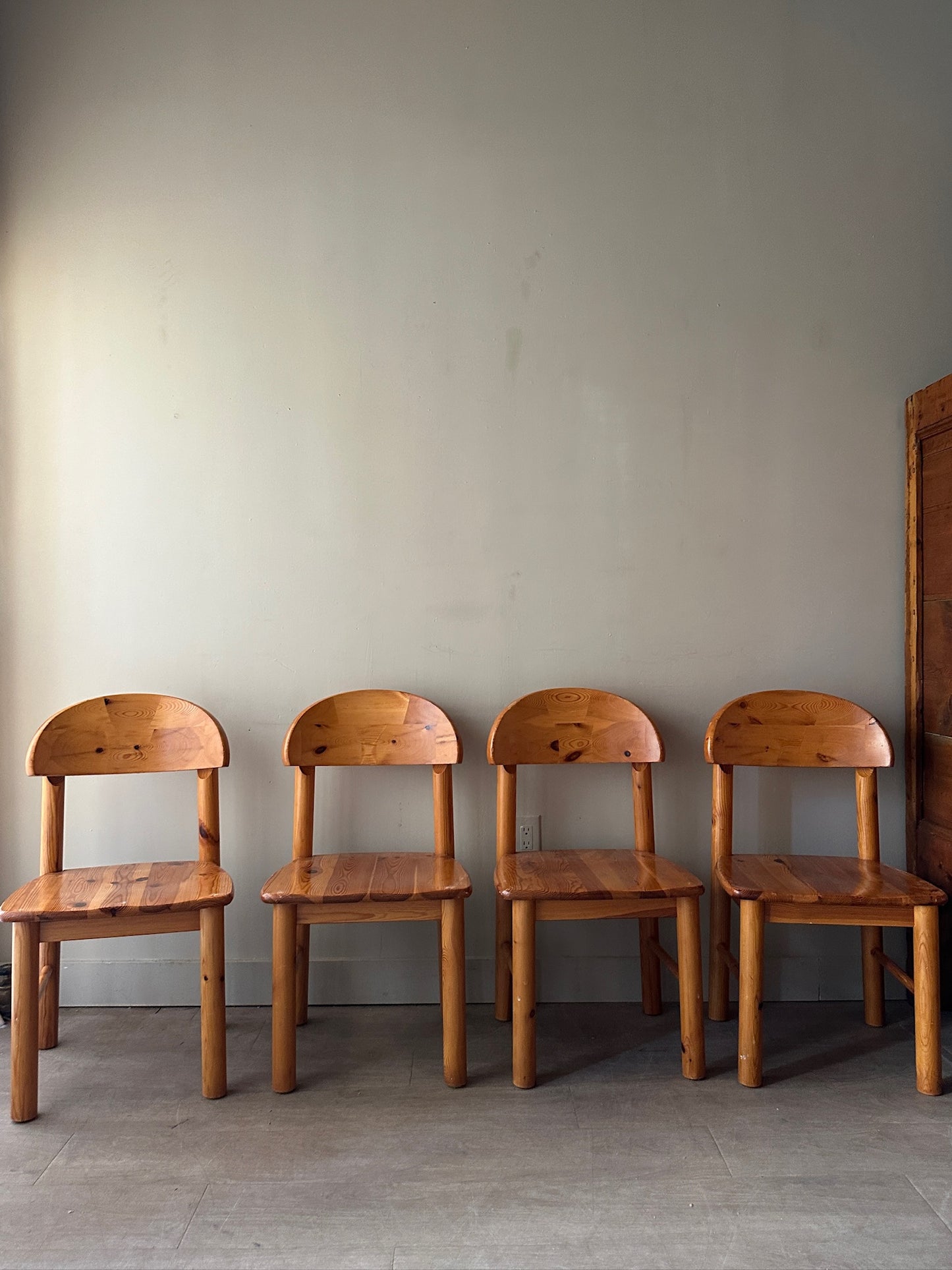Rainer Daumiller pine dining chairs. Sold as a set of 4.