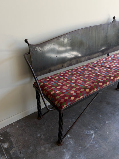 Wrought iron sculptural bench