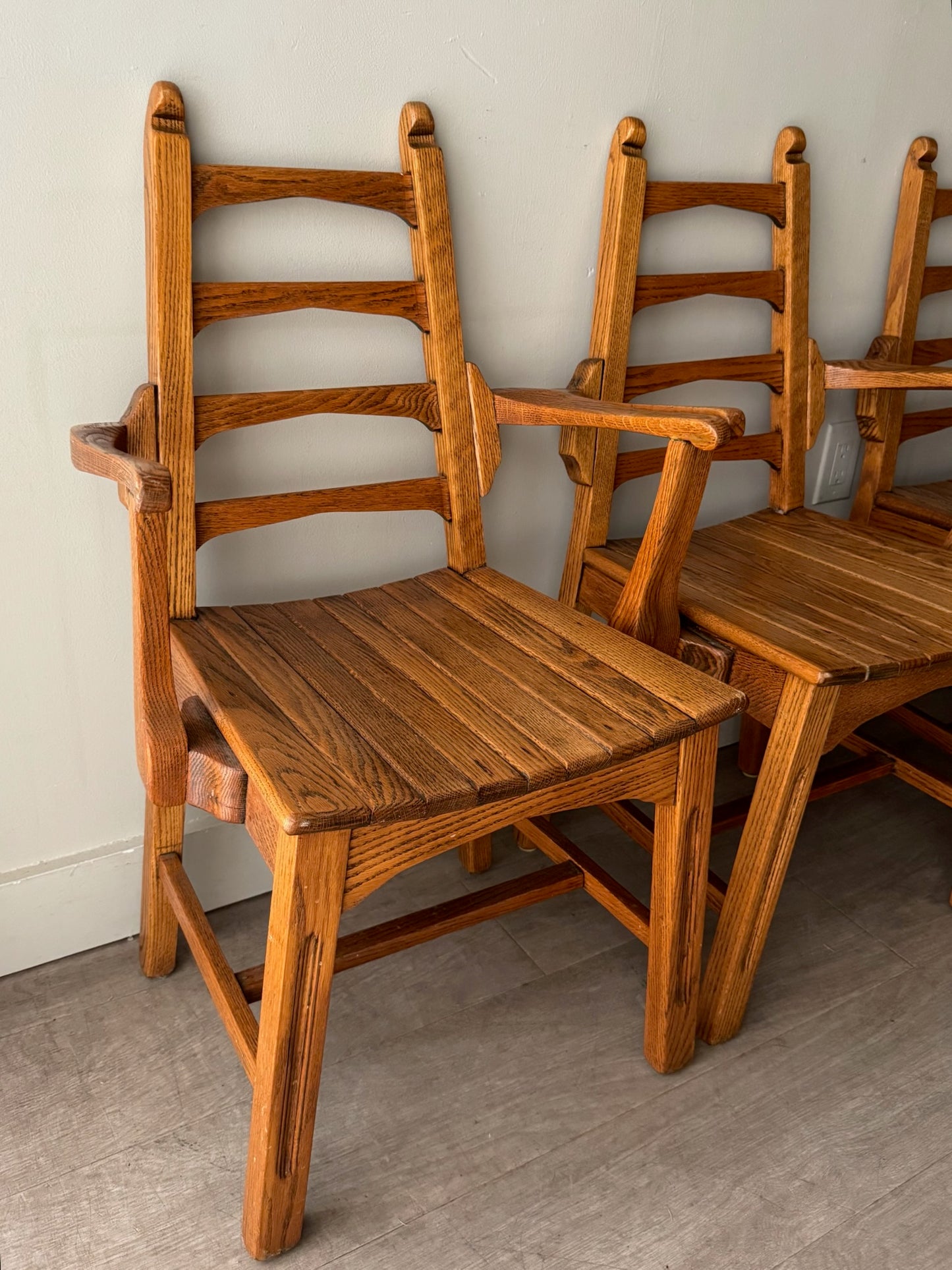 Scandinavian oak dining chairs. Sold in pairs.