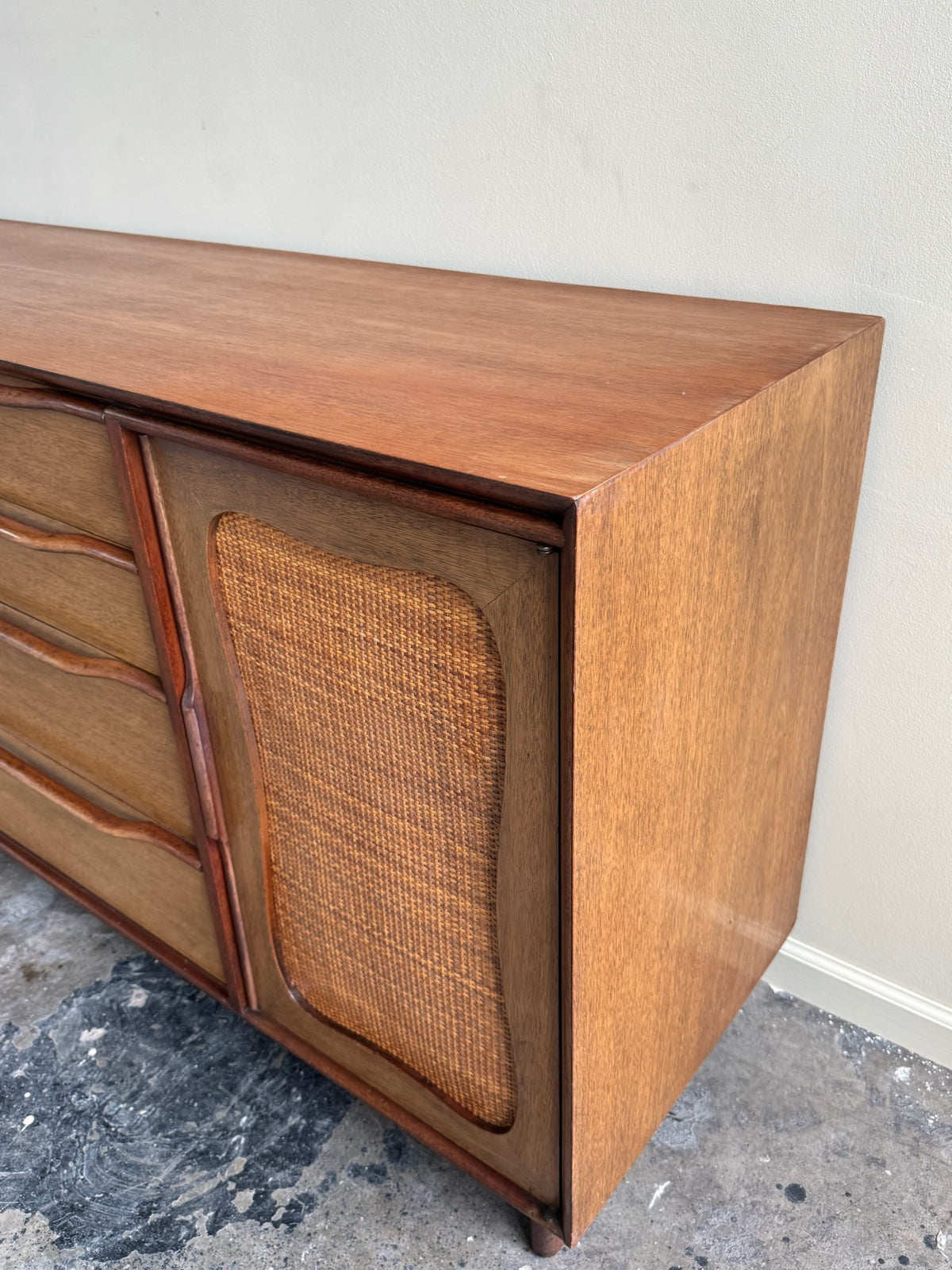 Walnut credenza with caning