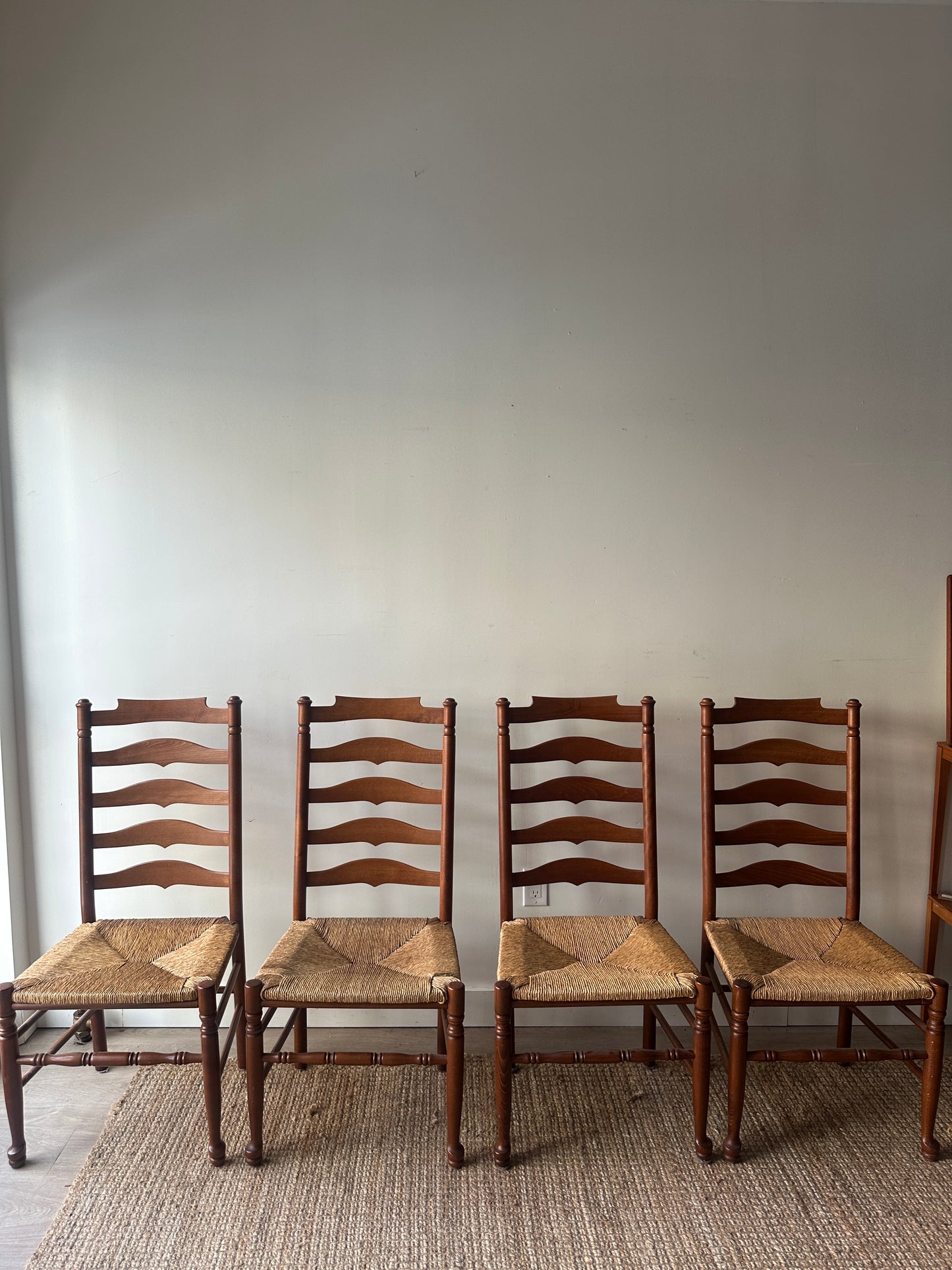 Set of 4 ladder back chairs. Sold as a set.
