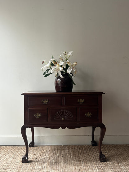 Carved mahogany console table