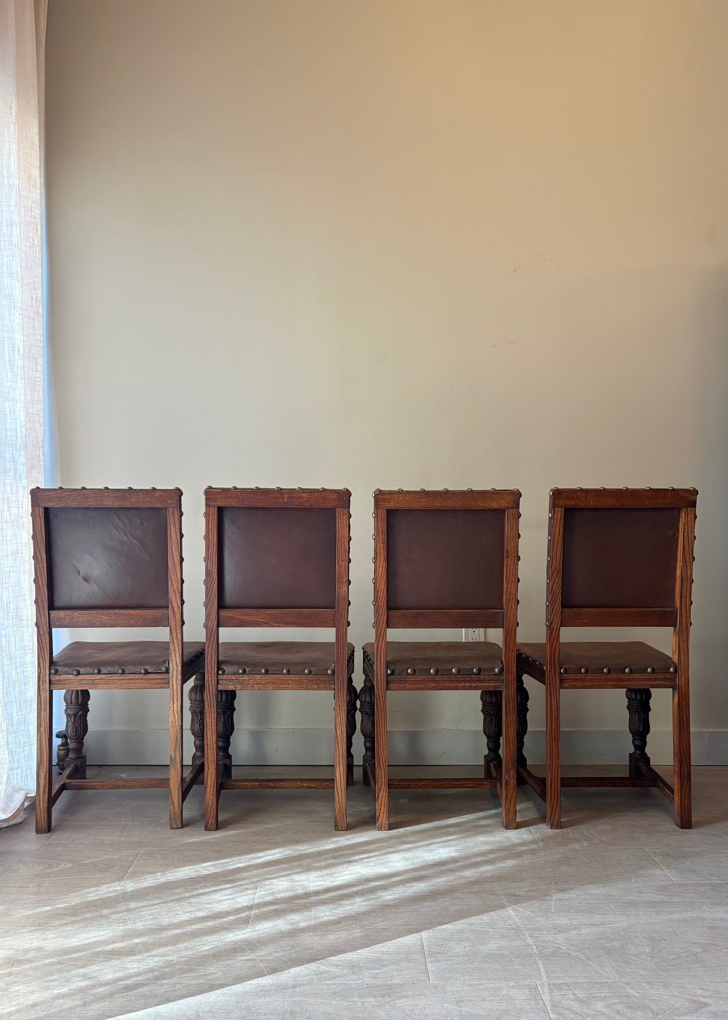 Leather and oak dining chairs. Sets of 2.