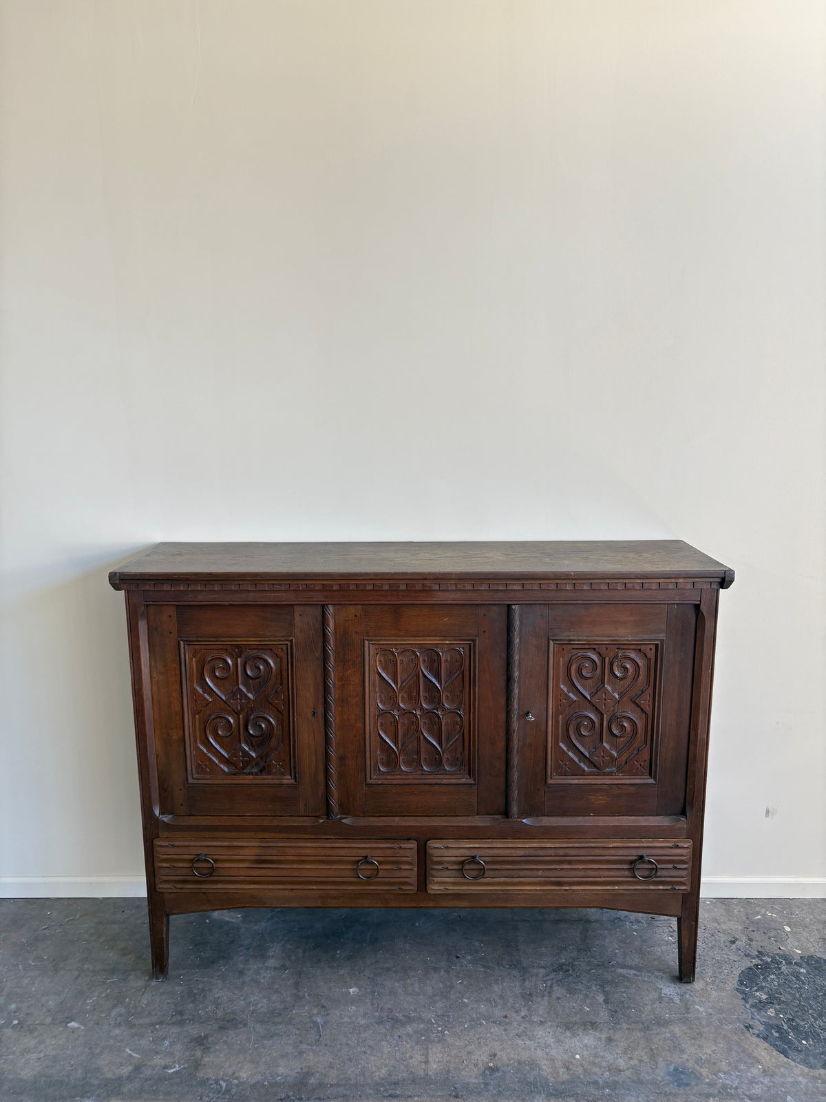Carved oak sideboard