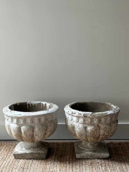 Round concrete planters. Sold individually.