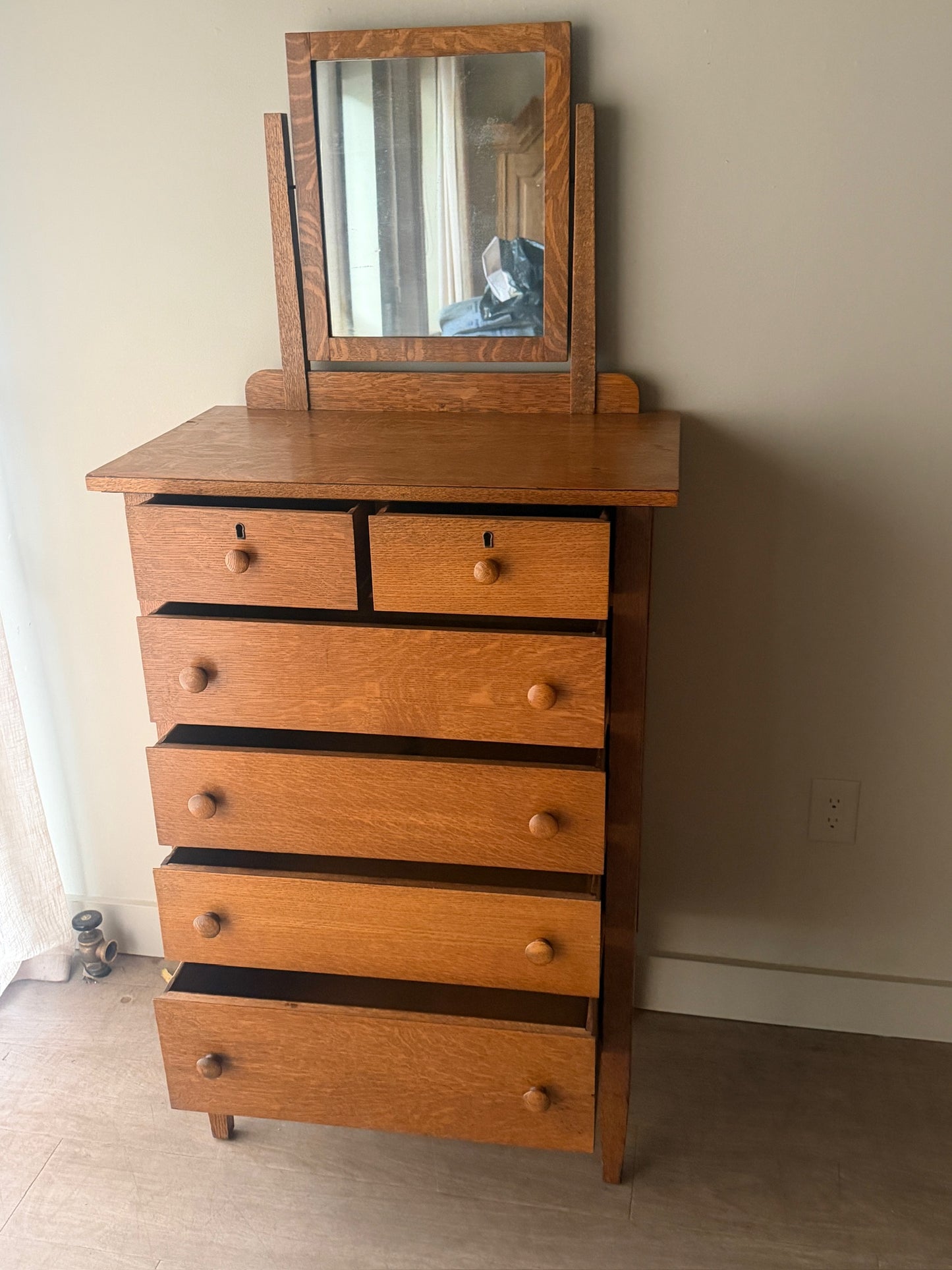 Golden oak tallboy with mirror