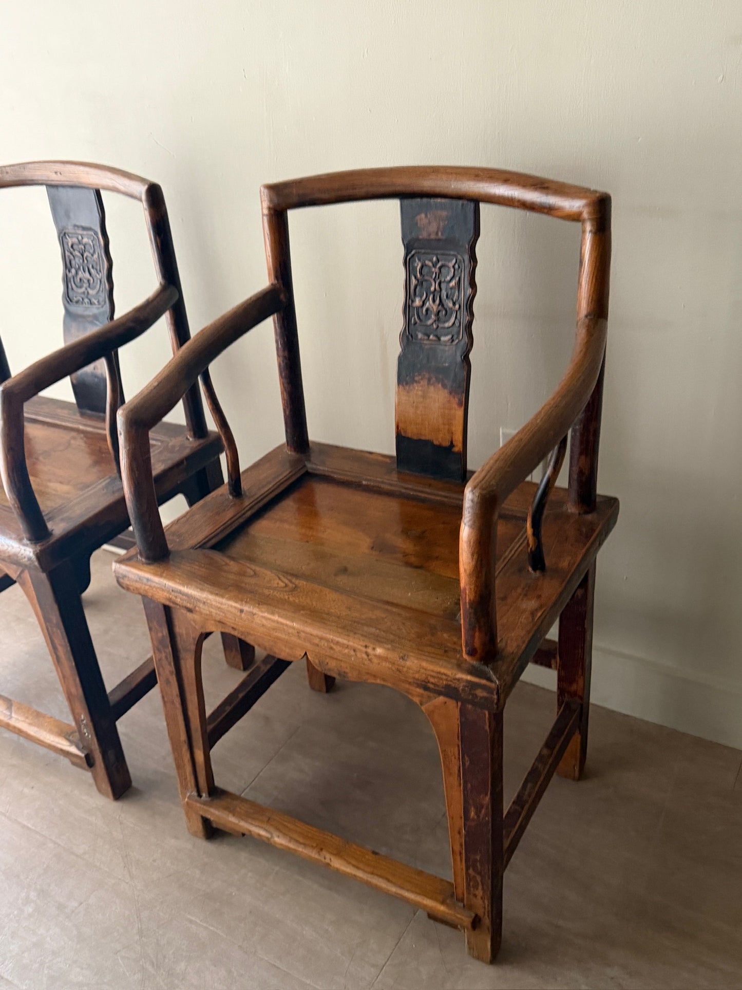 Chinese elmwood chairs. Sold individually.