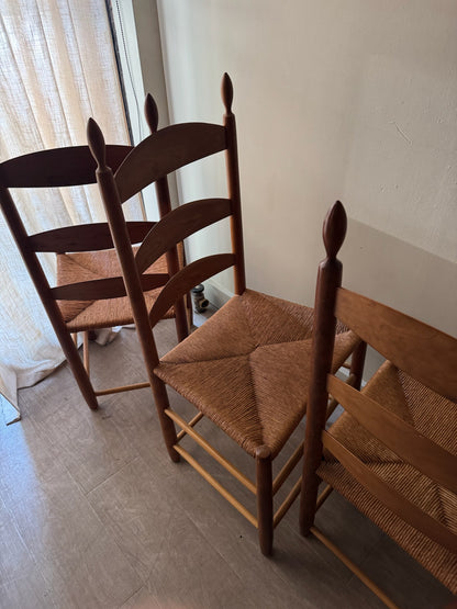 Cherry ladder back rush seat chairs. Sold individually.