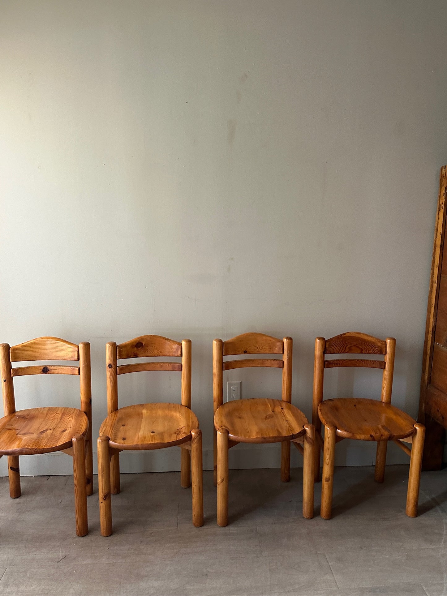 Rainer Daumiller pine dining chairs. Sold as a set of 4.