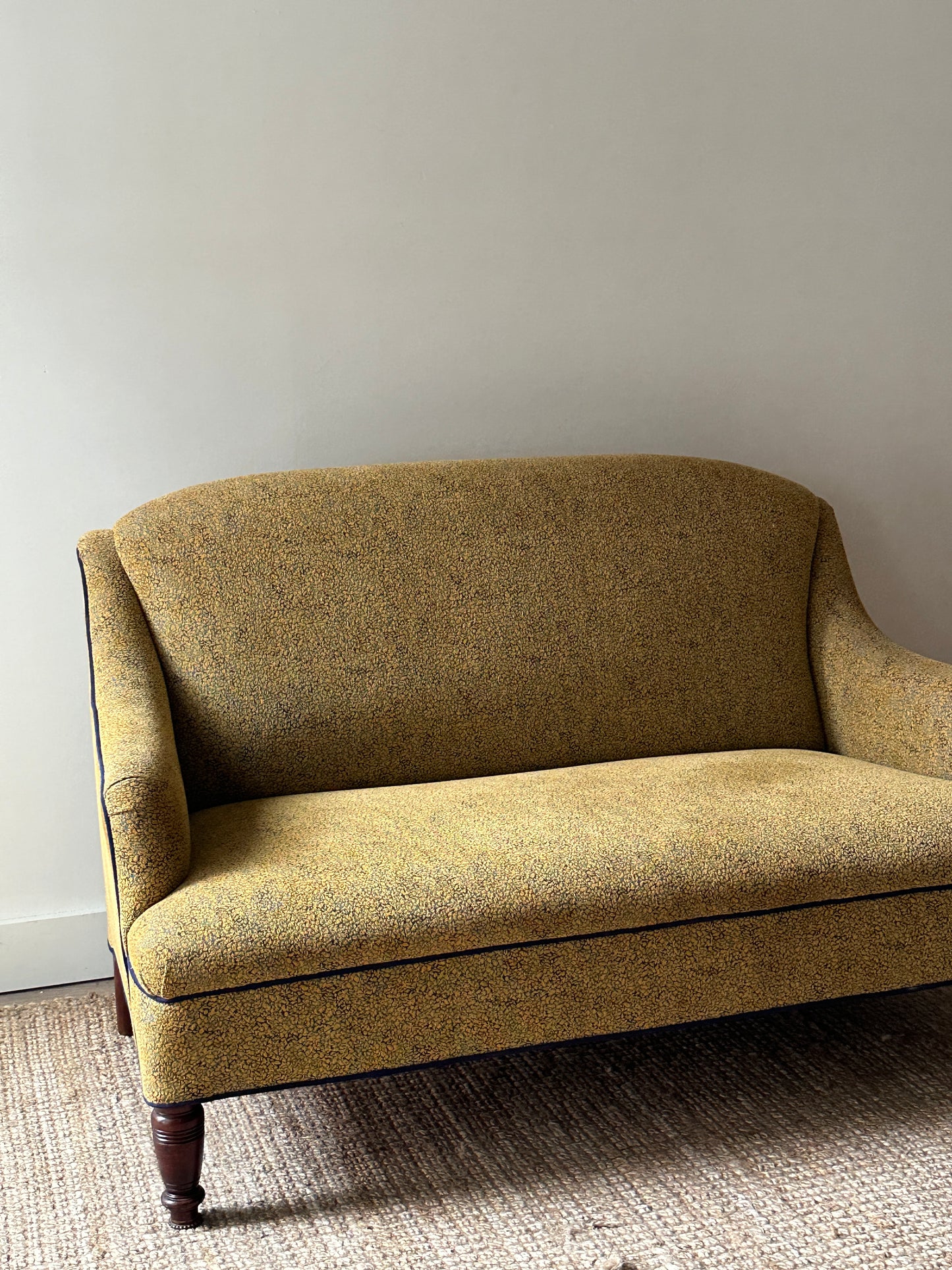 Brocade settee with navy piping