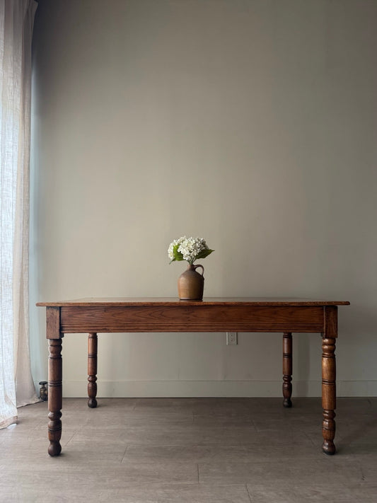 Golden oak dining table