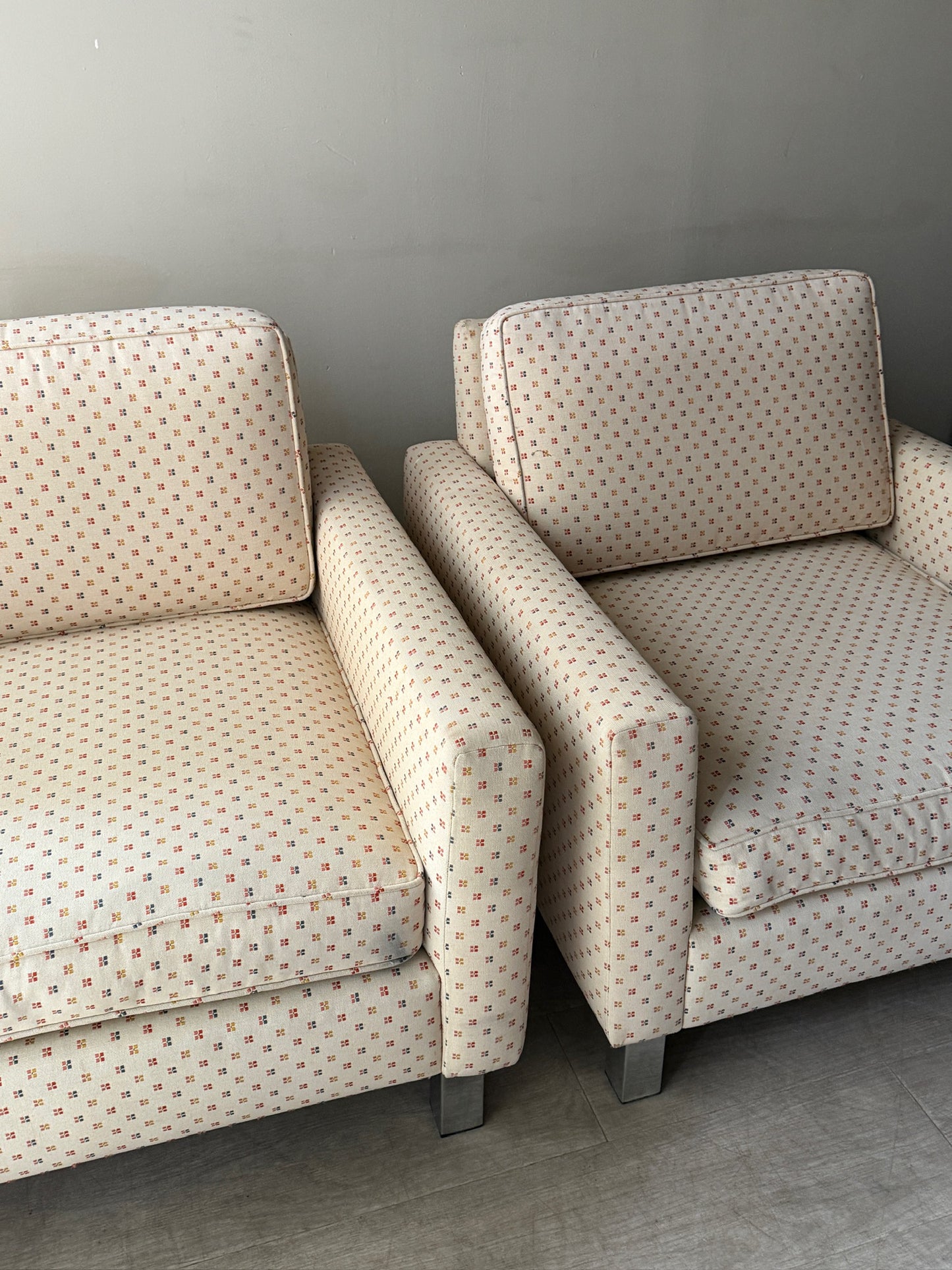 Upholstered chrome armchairs. Right.