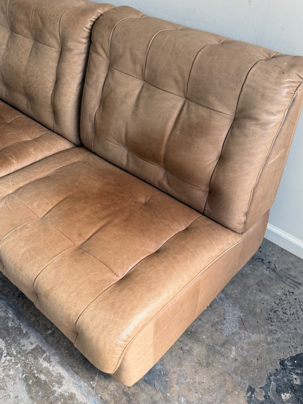 Swiss modular two-seat brown leather sofa