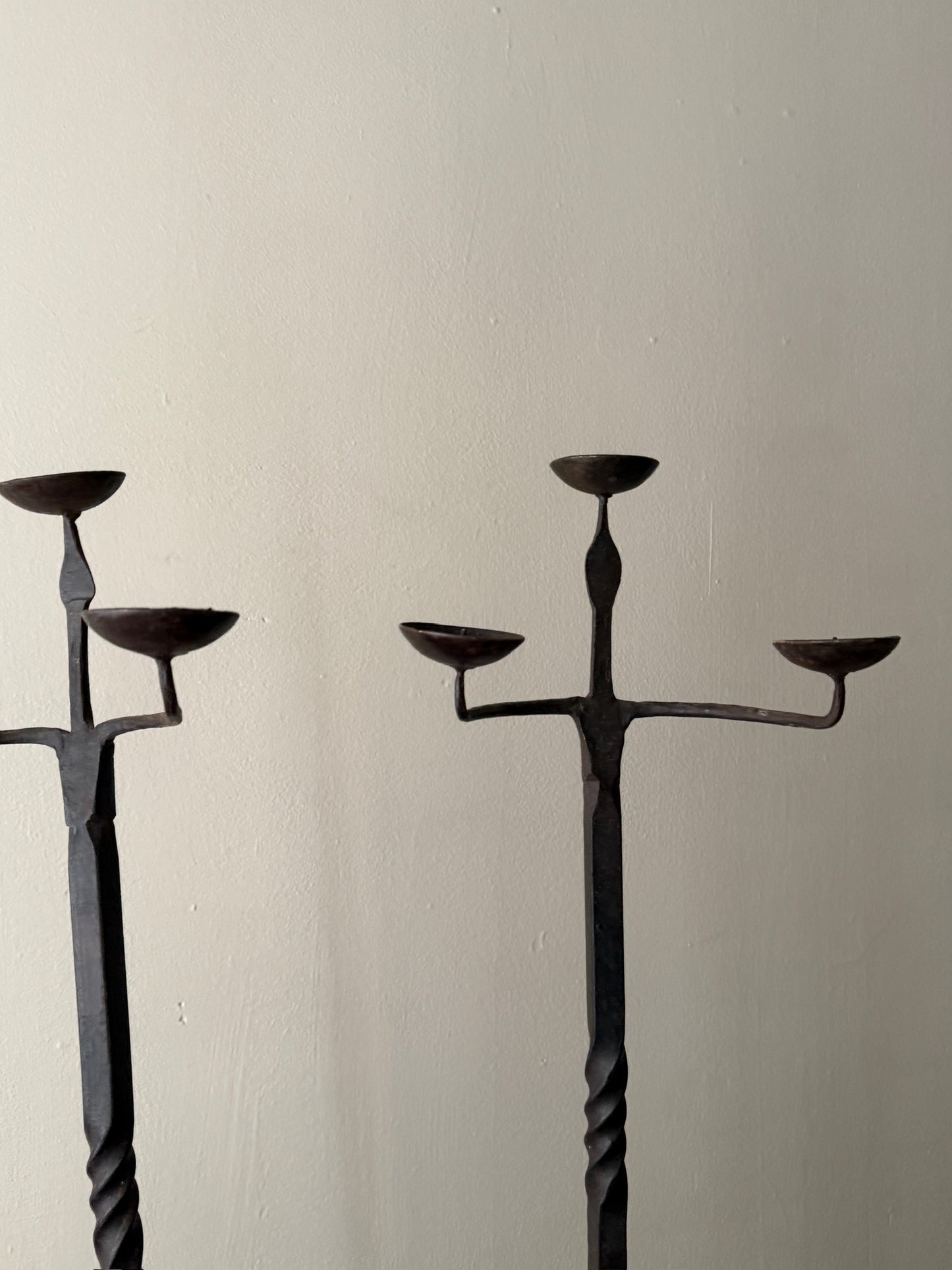 Pair of wrought iron candelabras