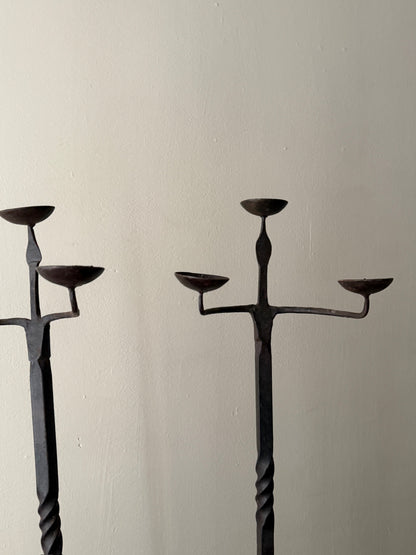 Pair of wrought iron candelabras