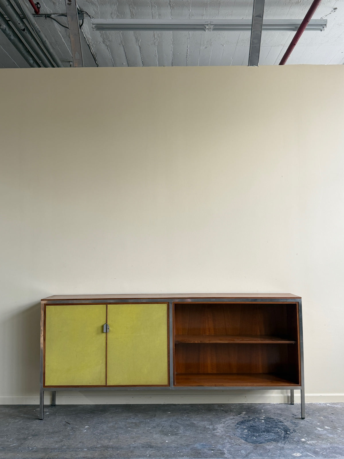 Nichols English bookcase with green vinyl doors