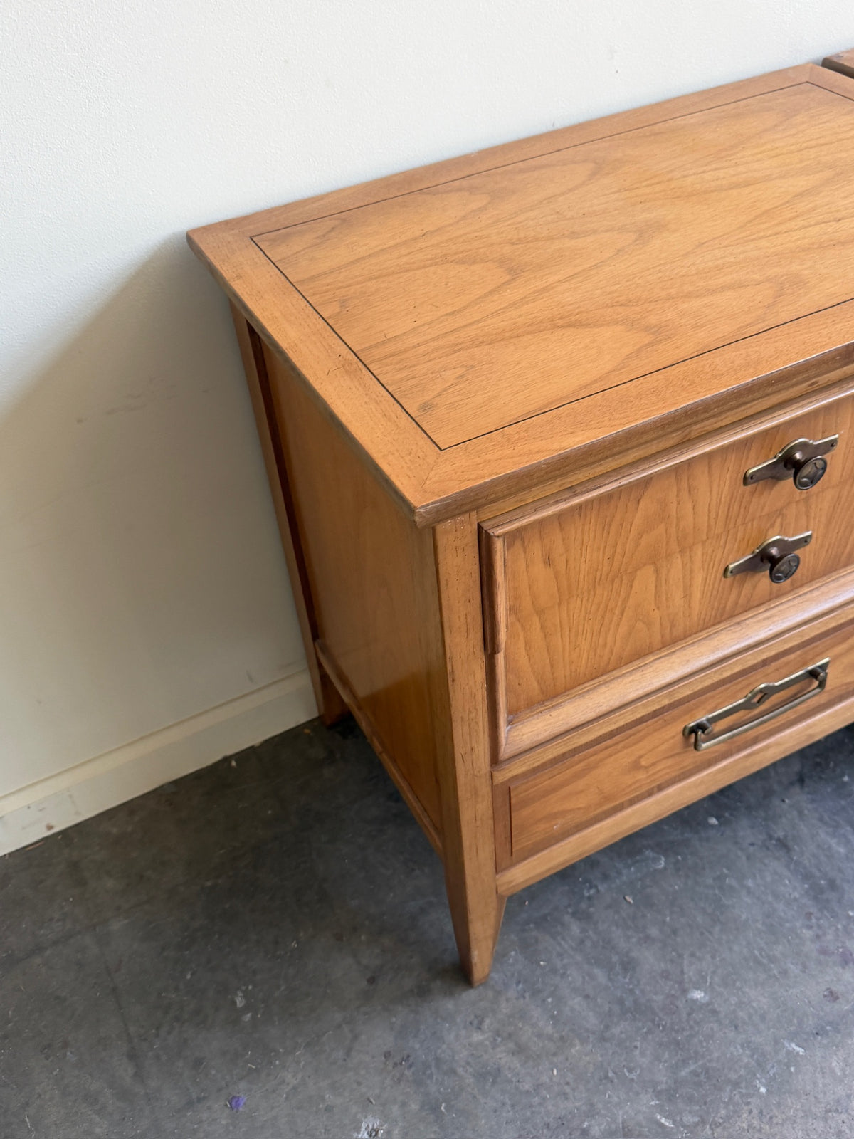 Walnut nightstands. Sold as a pair.