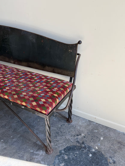 Wrought iron sculptural bench