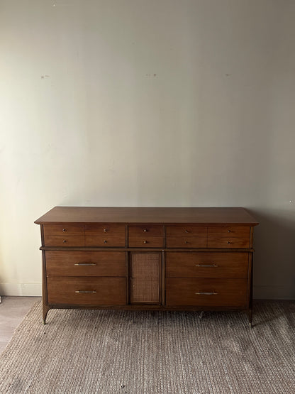 Walnut credenza with rattan door